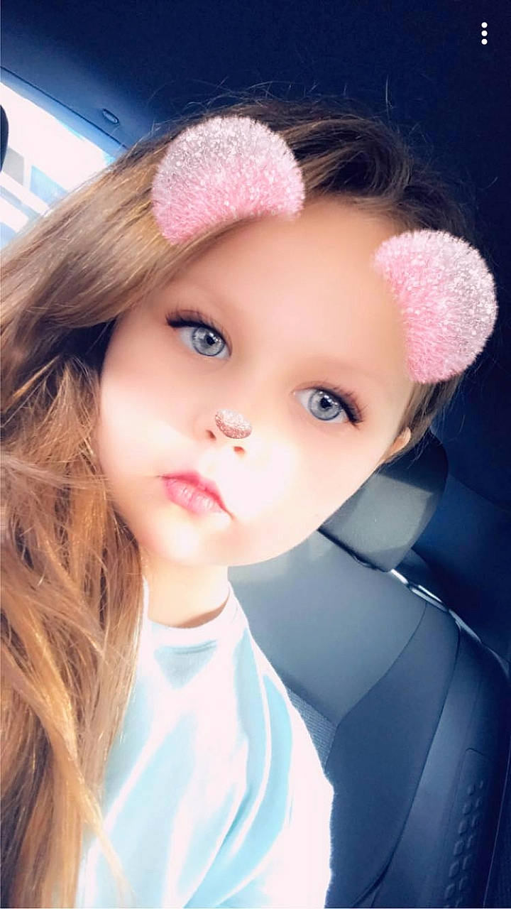Myla joined the competition — help win amazing prizes! beauty, brown_hair, cheek, child_model, chin, eye, eyebrow, eyelash, hair_accessory, hairstyle, knit_cap, lip, lip_gloss, long_hair, magenta, makeover, person, pink, portrait_photography, thread