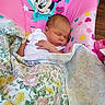newborn, baby, sleeping, infant, child, face, portrait, blanket, floral_blanket, pink, minnie_mouse, baby_seat, chair, indoor, cozy, peaceful, resting, white_clothing, nursery, photography