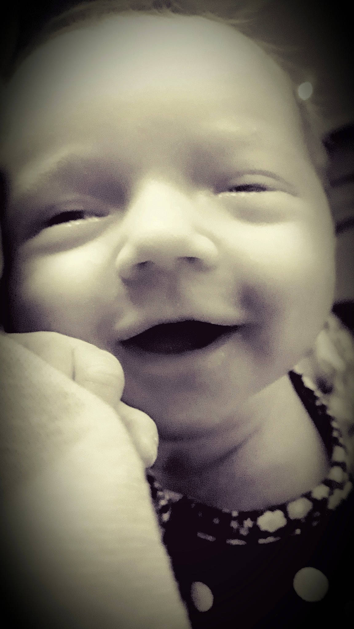 Katelyn is registered to the contest to win money with this photo: baby, black_and_white, cheek, child, chin, cloud, eye, face, facial_expression, fun, head, lip, monochrome, mouth, nose, person, photography, skin, smile, toddler