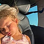 Inaya participe au concours pour gagner de l'argent avec cette photo : child, sleeping, curly_hair, car_seat, sunlight, window, seatbelt, pink_dress, indoors, portrait, young_child, peaceful, relaxed, summer, daylight, car_interior, seat, headrest, skin, closed_eyes