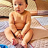 baby, child, infant, bed, blanket, quilt, skin, barefoot, hands, feet, indoors, cute, curious, sitting, portrait, natural_light, home, soft, comfort, expression