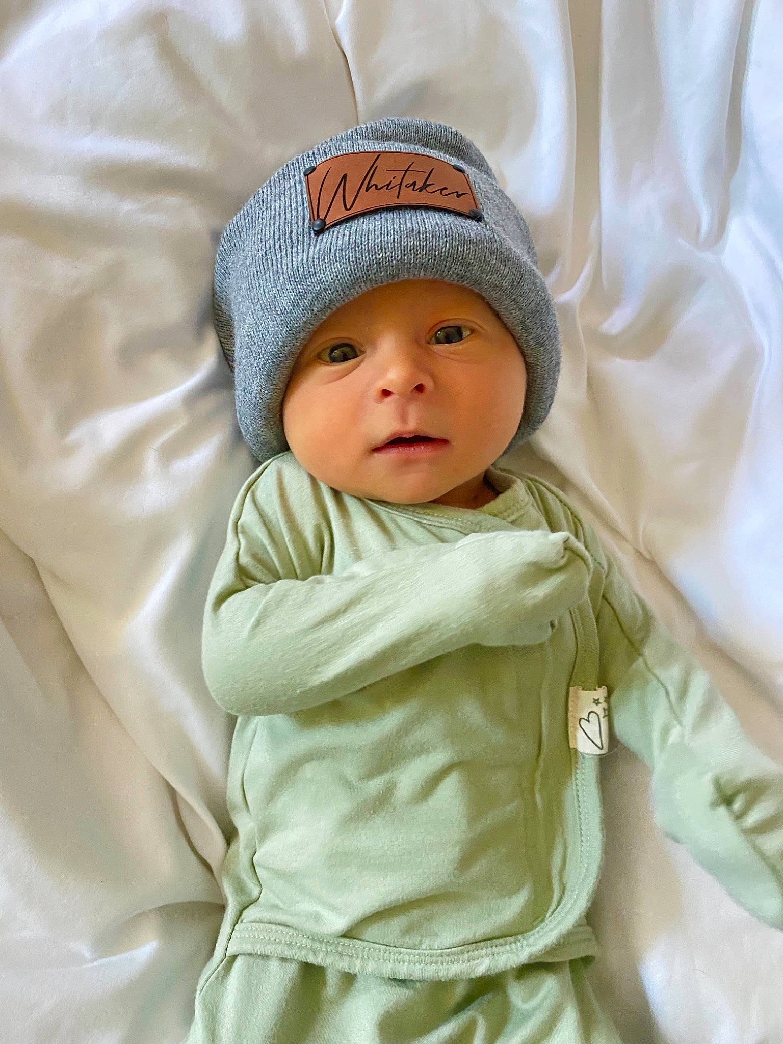 Whitaker joined the competition — help win amazing prizes! baby, baby_products, baby_safety, baby_sleeping, baby_toddler_clothing, cap, cheek, child, comfort, face, hat, headwear, linens, person, room, skin, sleeve, toddler, white