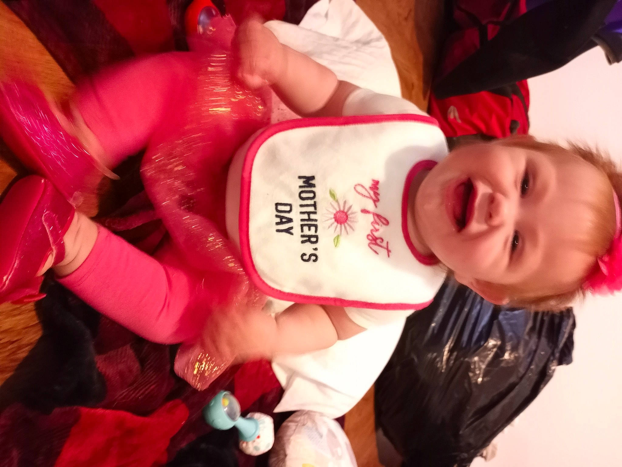 Octavia is registered to the contest to win money with this photo: baby_toddler_clothing, carmine, child, cool, event, facial_expression, finger, fun, gesture, happy, lip, magenta, mouth, person, pink, plant, skin, sleeve, smile, toddler