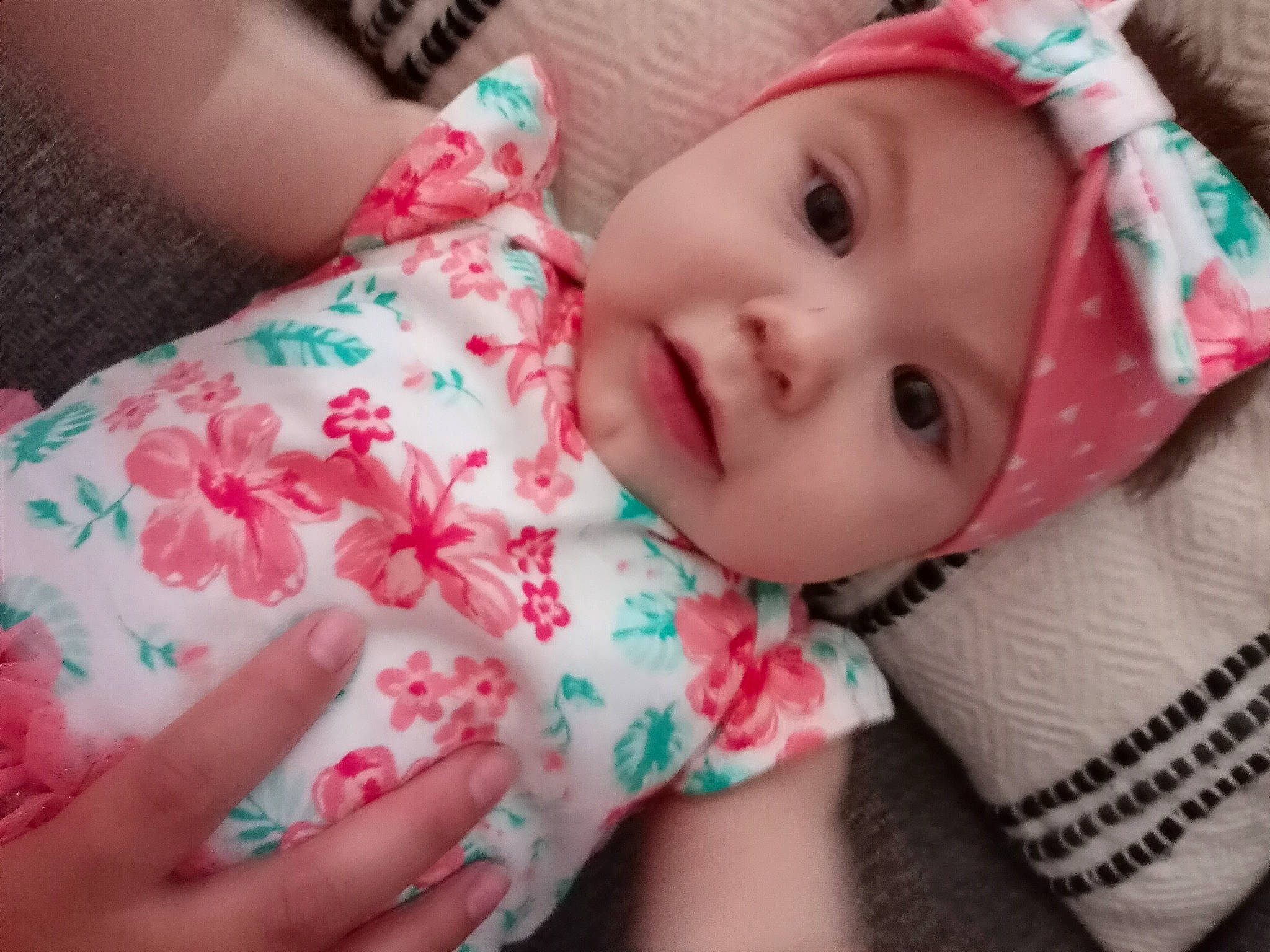 Octavia joined the competition — help win amazing prizes! baby, baby_toddler_clothing, cheek, child, eye, eyelash, finger, hand, happy, headwear, human, iris, lip, mouth, nail, nose, pattern, person, pink, skin