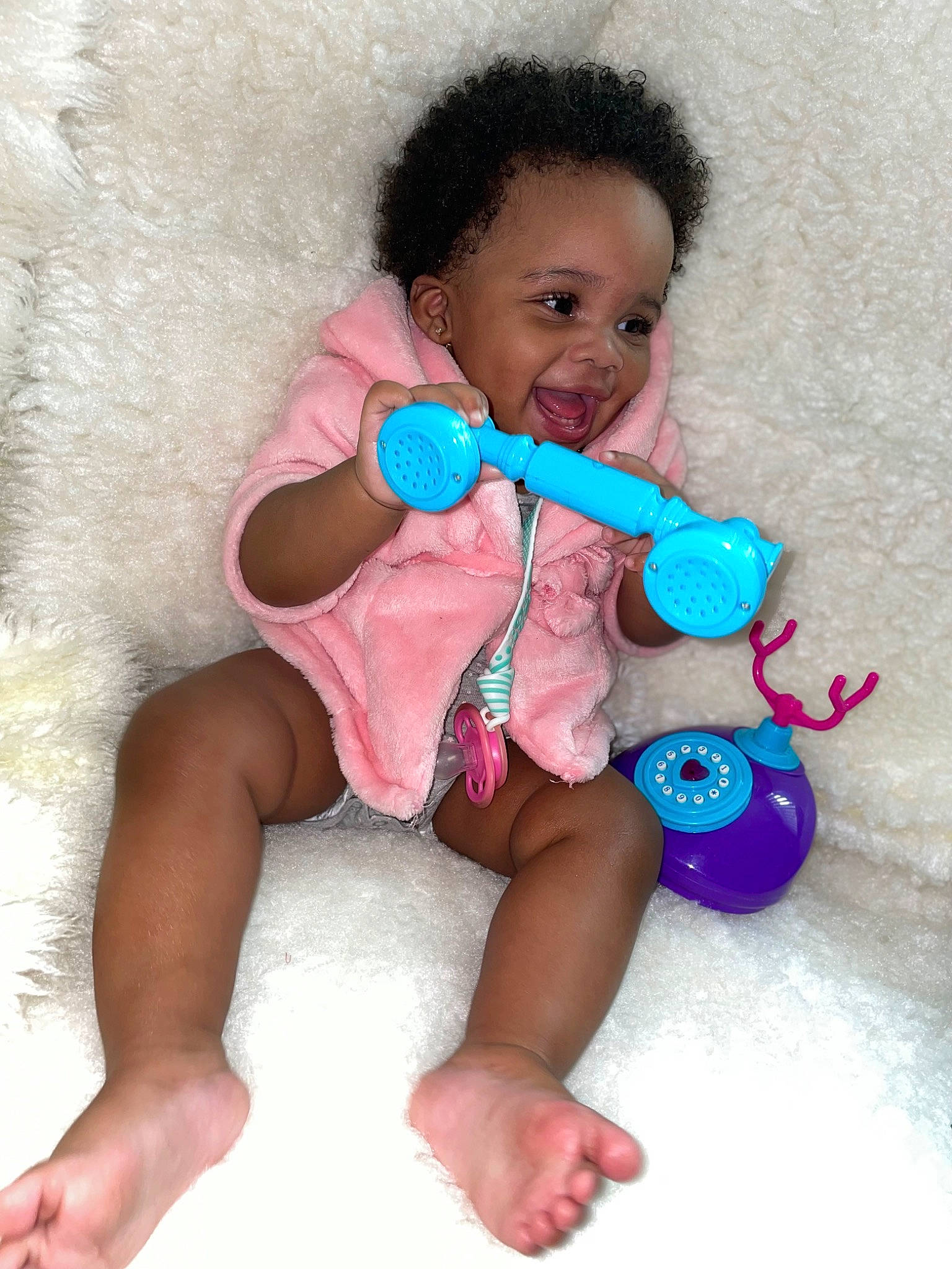 Mellow joined the competition — help win amazing prizes! arm, baby, baby_playing_with_toys, baby_products, baby_toddler_clothing, cheek, child, finger, fun, happy, head, magenta, person, pink, play, sitting, skin, sleeve, textile, toddler