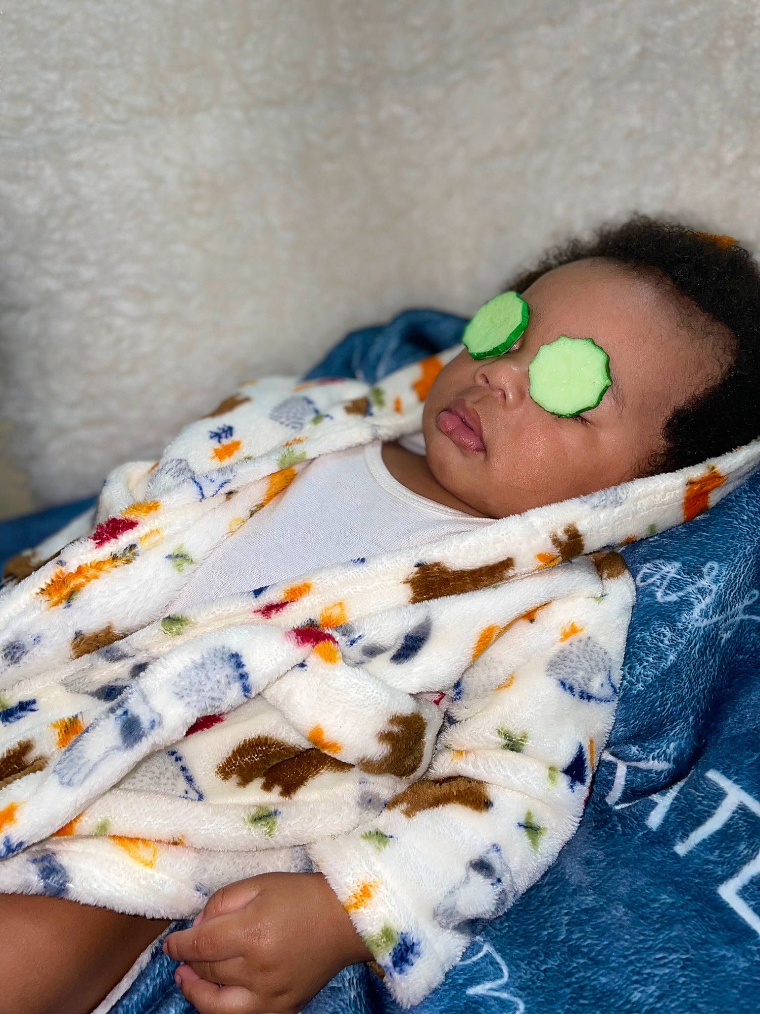 Karson is registered to the contest to win money with this photo: baby, baby_products, baby_sleeping, baby_toddler_clothing, bed_sheet, bedding, bedtime, blanket, child, comfort, hand, human_body, linens, nap, pattern, person, room, skin, sleep, sleeve