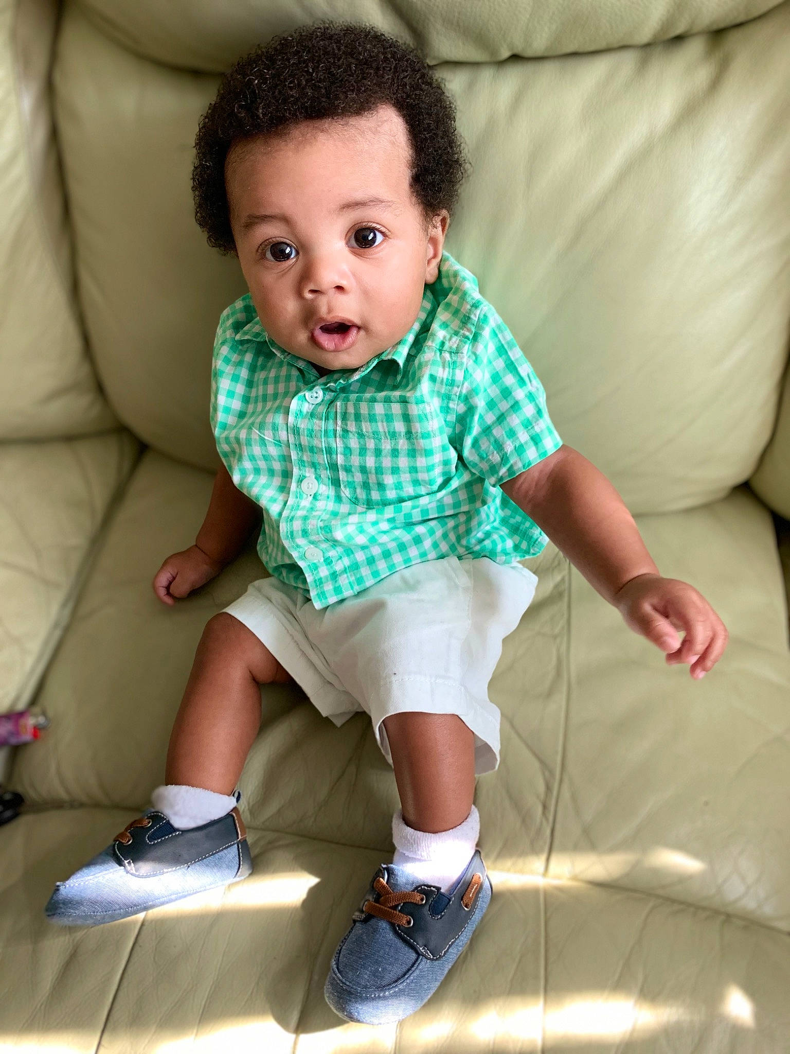 Karson joined the competition — help win amazing prizes! baby_toddler_clothing, comfort, couch, dress, finger, flash_photography, grass, hair, happy, knee, leg, person, pink, shoe, shorts, sleeve, sneakers, sock, surprise, textile