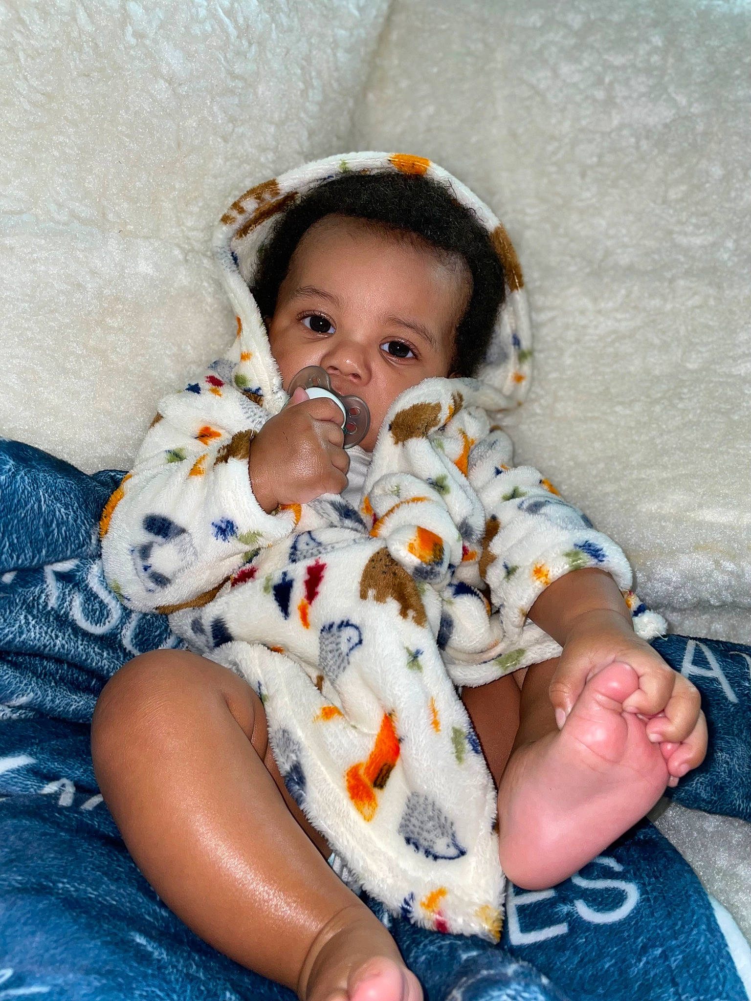 Karson joined the competition — help win amazing prizes! baby, baby_toddler_clothing, cheek, child, comfort, fun, happy, head, human_leg, iris, linens, pattern, person, sitting, skin, sleeve, thigh, toddler