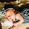 Luna joined the competition — help win amazing prizes! baby, sleeping, blue_outfit, headband, blanket, soft_lighting, cozy, infant, cute, peaceful, resting, newborn, portrait, indoor, closeup, child, face, skin, hand, pillow