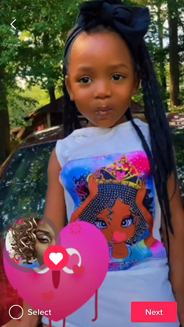 Khamari joined the competition — help win amazing prizes! beauty, black_hair, dress, face, facial_expression, fun, grass, hair, hairstyle, happy, head, leisure, magenta, mammal, person, pink, plant, recreation, summer, toy