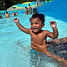 Karmelo joined the competition — help win amazing prizes! toddler, child, water, pool, swimming, splashing, smiling, happy, sunny, outdoor, water_park, people, adult, tattoo, blue_wall, life_jacket, umbrella, trees, summer, recreation