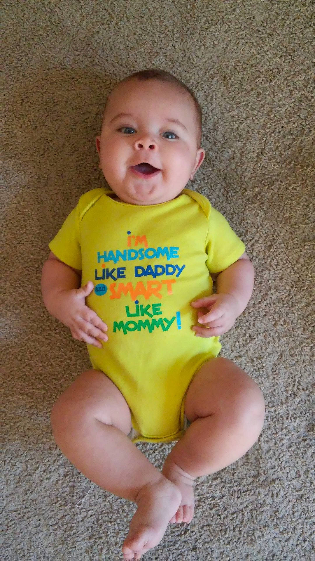 Brayden joined the competition — help win amazing prizes! abdomen, cheek, child, finger, fun, hand, infant, iris, leg, mouth, person, play, product, sitting, skin, smile, toddler, yellow