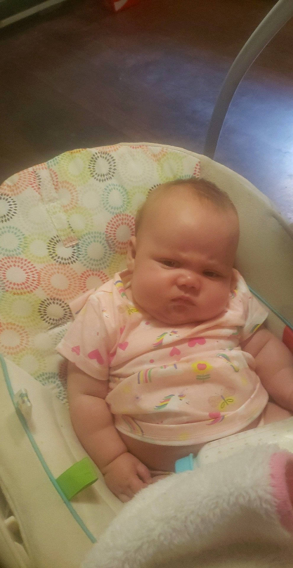 Jersey is registered to the contest to win money with this photo: abdomen, baby, baby_products, baby_toddler_clothing, cheek, chest, child, circle, comfort, human_body, iris, linens, lip, nose, person, pink, room, sitting, skin, stomach