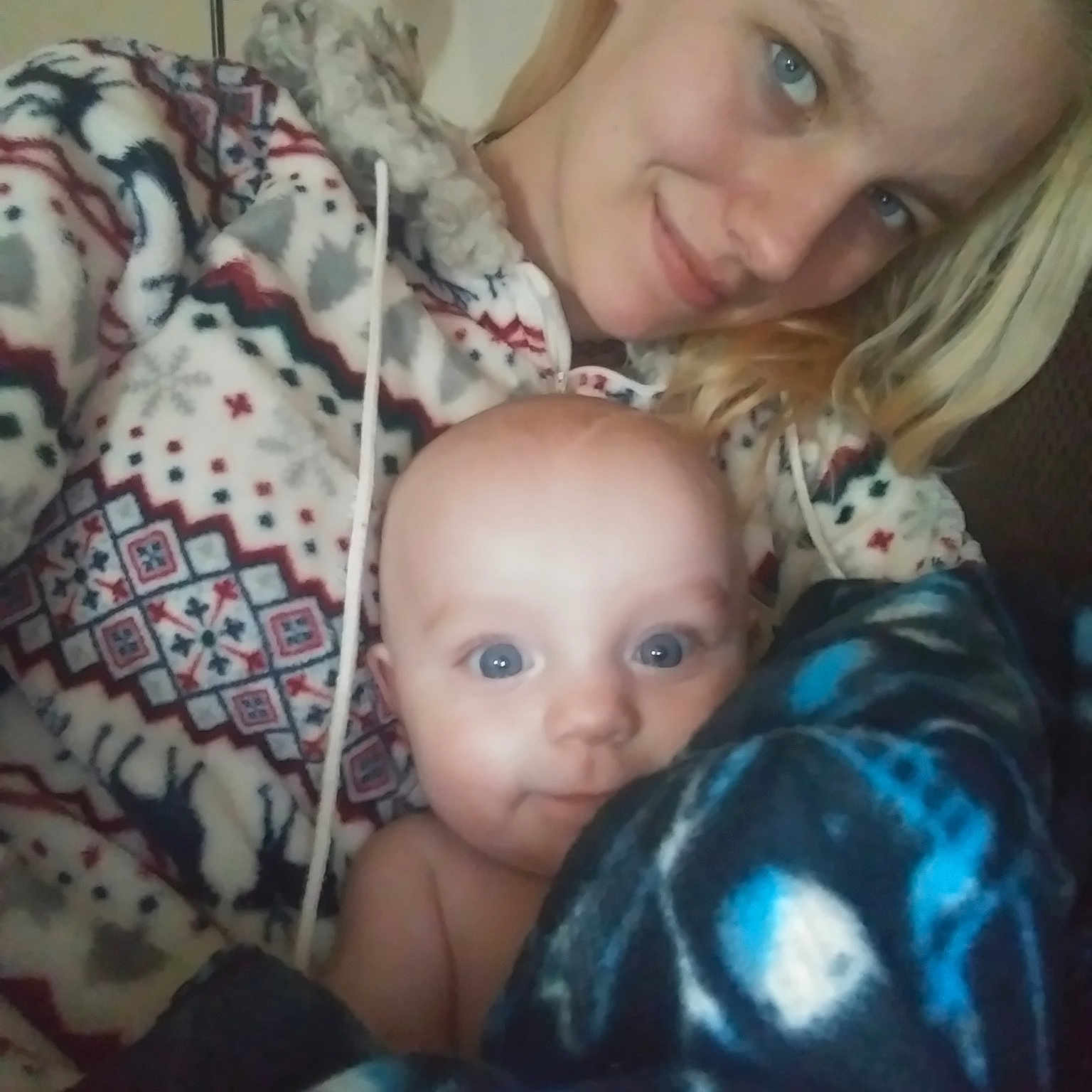 Gabriel is registered to the contest to win money with this photo: baby, blond, cheek, child, daughter, electronic_device, eye, face, head, iris, lip, mother, nose, person, photography, selfie, smile, toddler