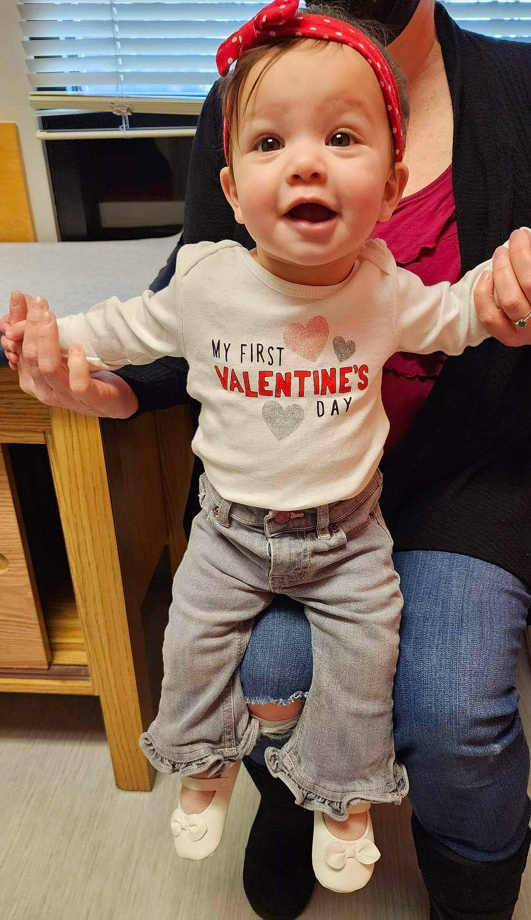 Sophia Eloise is registered to the contest to win money with this photo: baby, baby_toddler_clothing, cheek, child, cool, denim, face, fun, gesture, happy, person, skin, sleeve, smile, sportswear, standing, t_shirt, thumb, toddler, waist