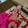 Paisley joined the competition — help win amazing prizes! baby, infant, red_hearts, clothing, blanket, rose_petals, floor, wood_floor, celebration, happy, smiling, person, pink_flower_arrangement, sign, five_months, cute, lying_down, indoors, decor, baby_clothes
