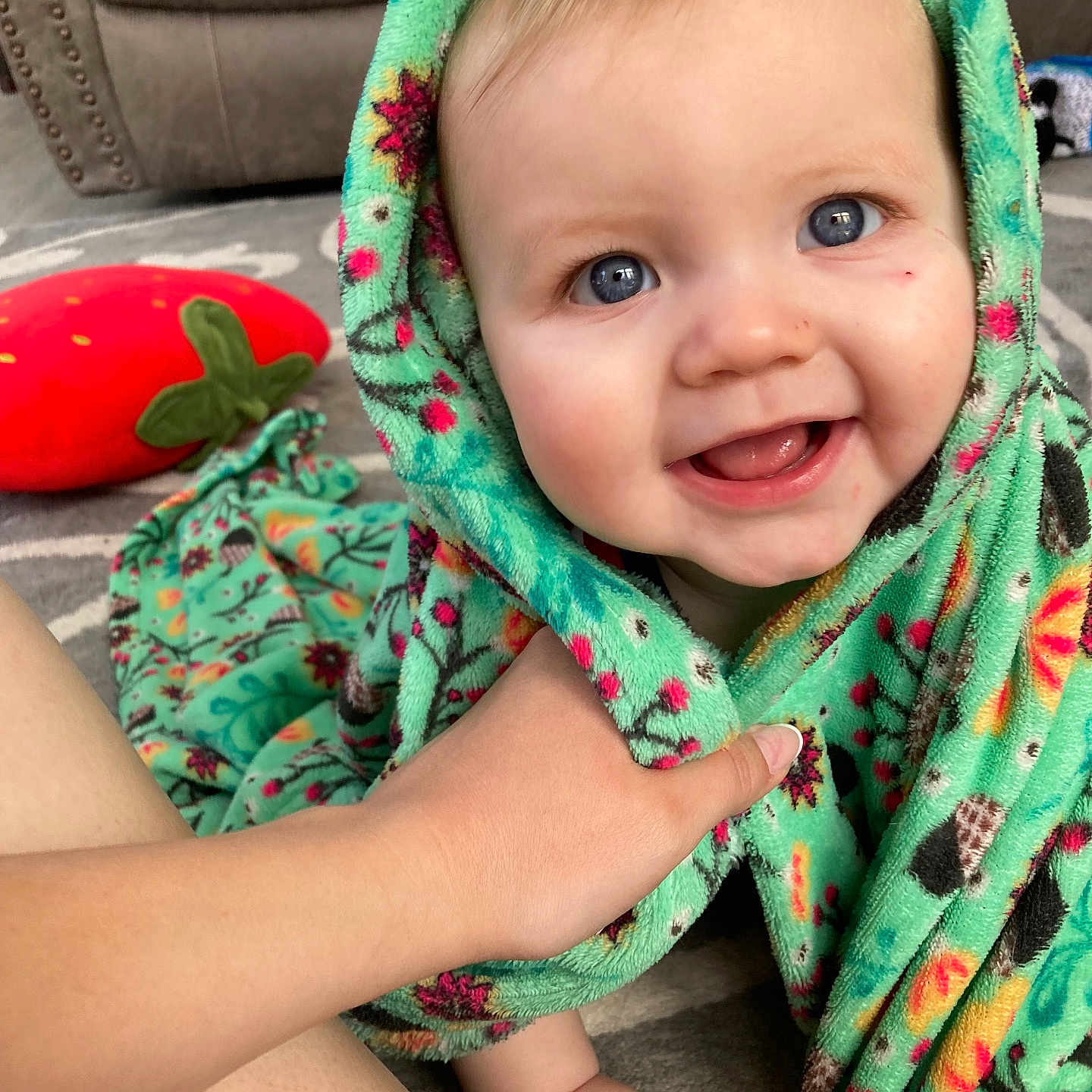 Asher joined the competition — help win amazing prizes! baby, babylaughing, blanket, bodypart, clothing, coat, dress, face, happy, head, hood, jacket, laughing, person, photography, portrait, quilt, scarf, smile, towel