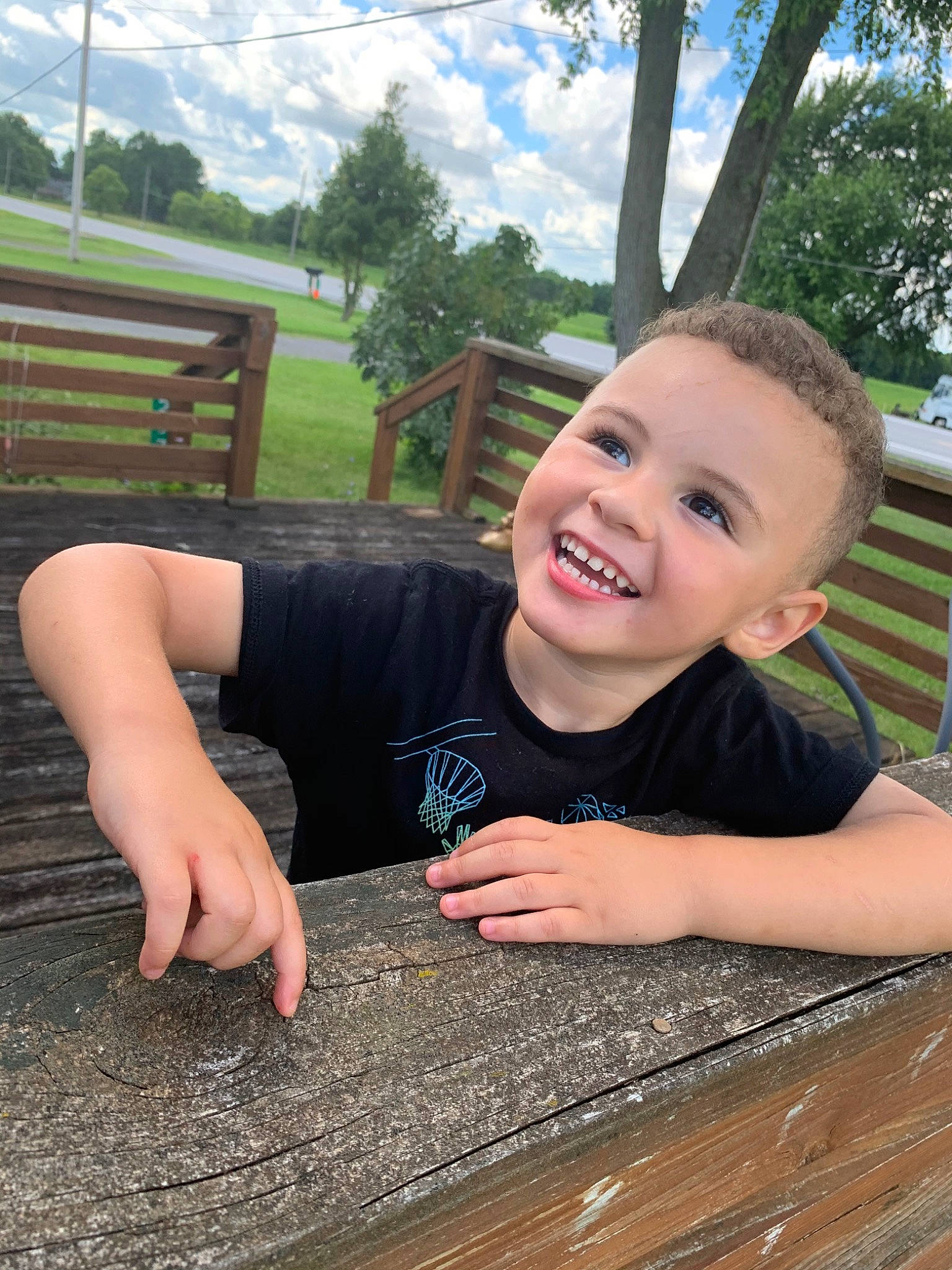 Darien joined the competition — help win amazing prizes! arm, child, finger, fun, hand, joy, leg, leisure, person, photography, sitting, smile, vacation, wood