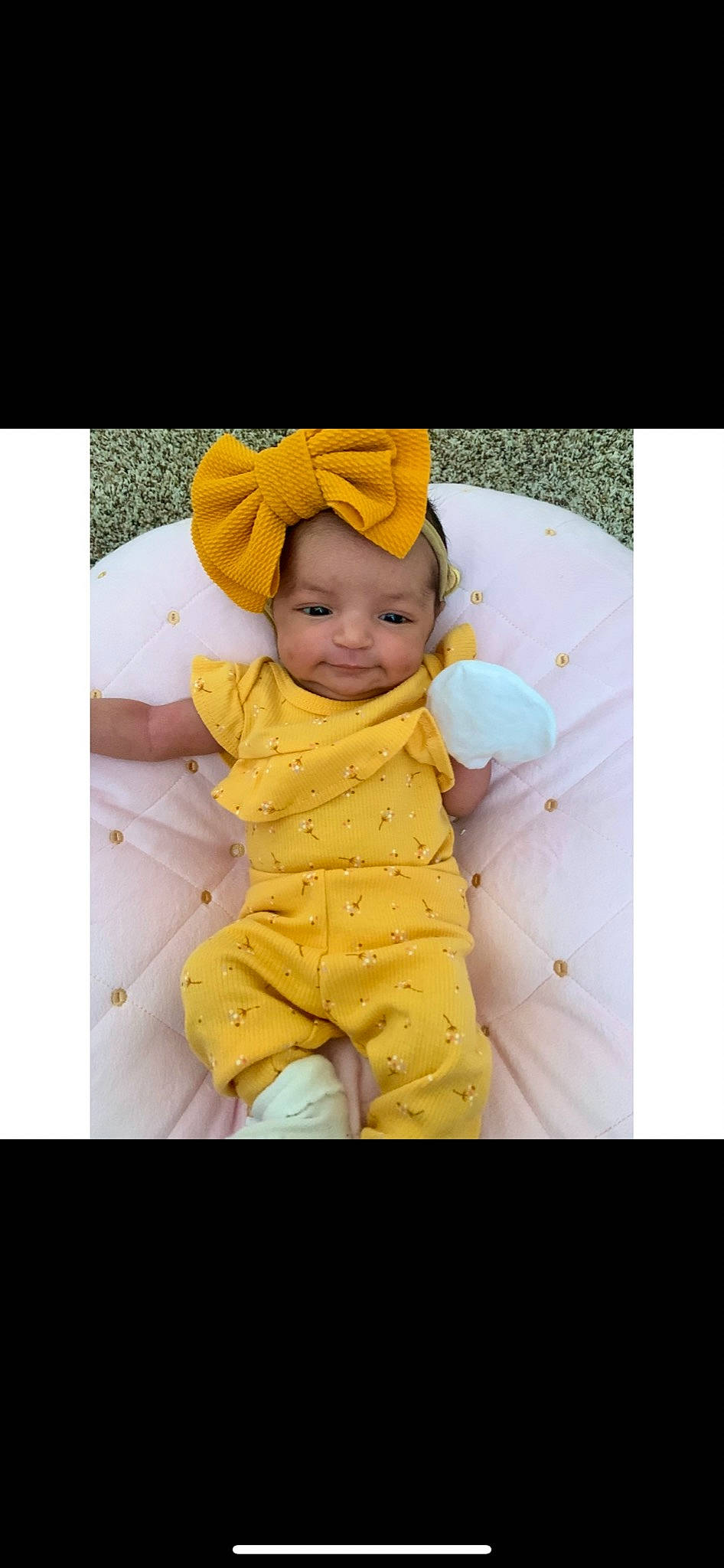 Alyssia joined the competition — help win amazing prizes! baby, baby_products, baby_toddler_clothing, beanie, cap, child, clothing, comfort, font, fun, gesture, happy, hat, hood, linens, person, sitting, sleeve, smile, t_shirt