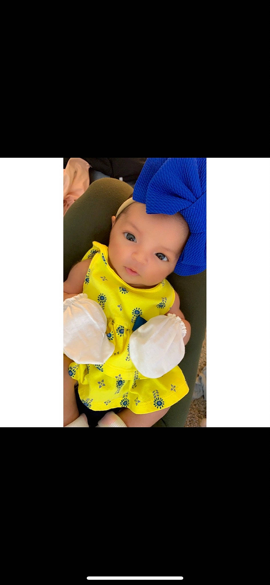 Alyssia is registered to the contest to win money with this photo: baby, baby_products, baby_toddler_clothing, baseball_cap, cap, cheek, child, eye, fictional_character, figurine, font, happy, head, headgear, pattern, person, play, plush, sitting, sleeve