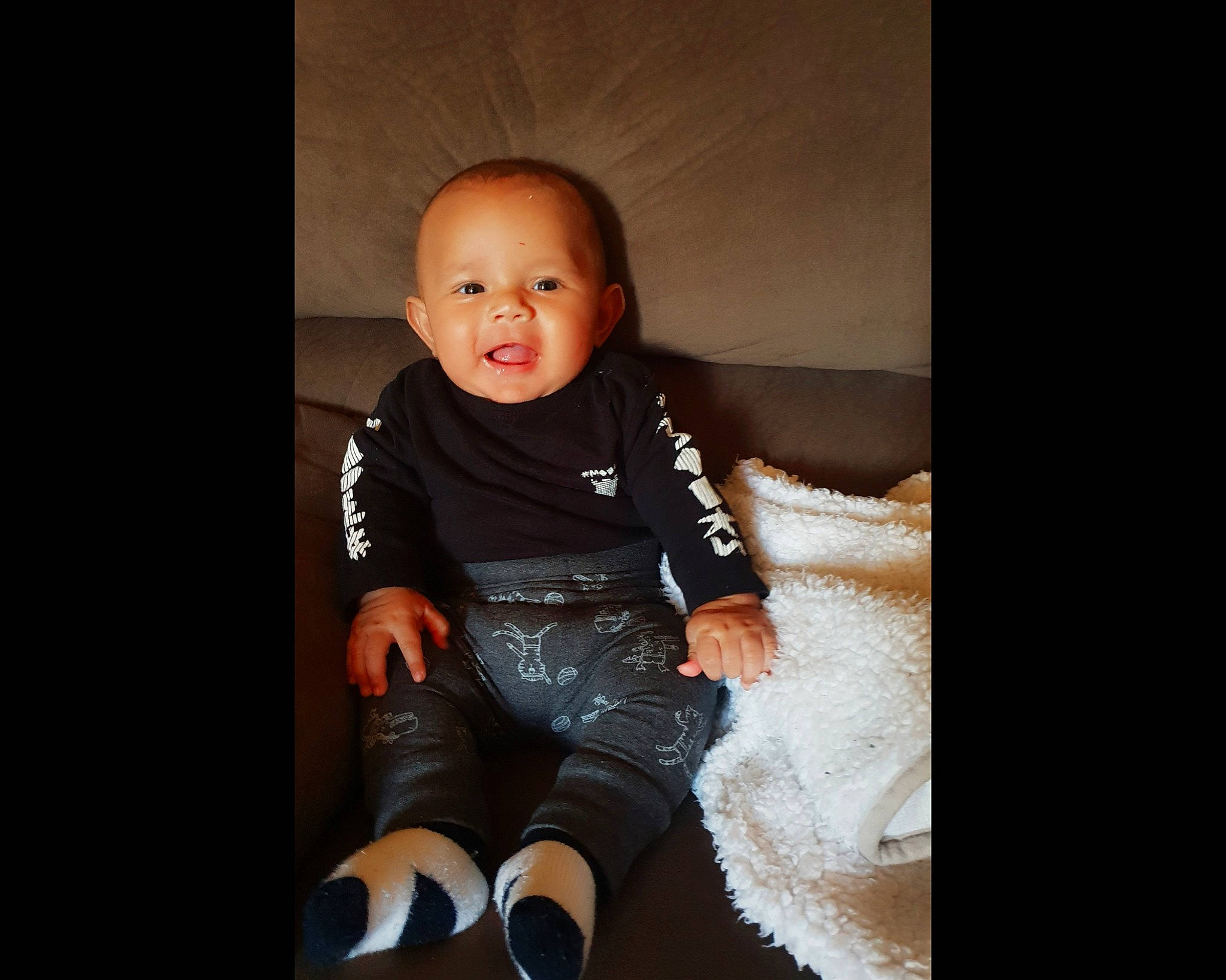 Sebastien joined the competition — help win amazing prizes! arm, baby, beauty, cheek, child, cool, eye, face, facial_expression, footwear, head, human, leg, nose, person, product, sitting, skin, smile, standing