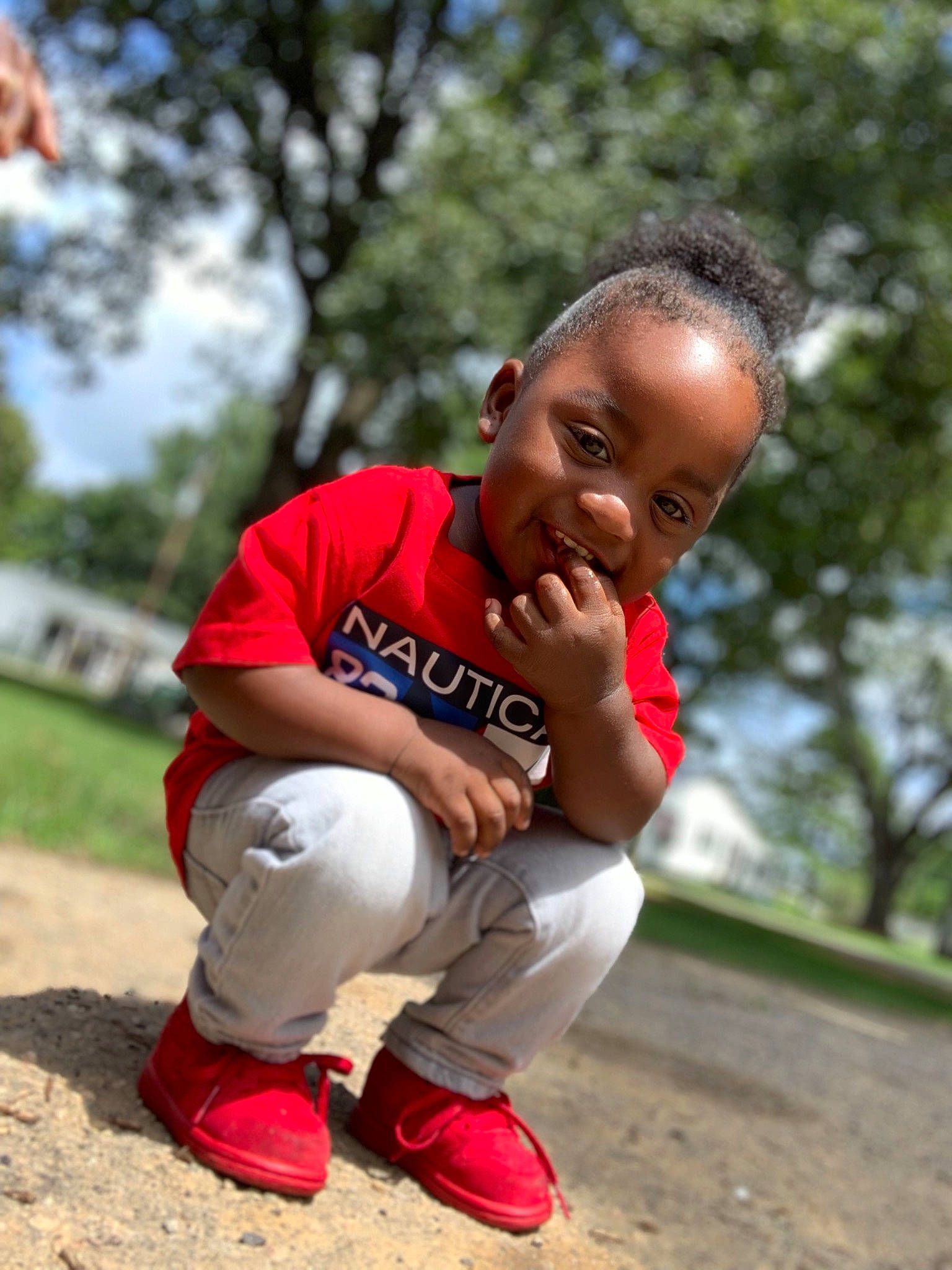 Jakari is registered to the contest to win money with this photo: arm, child, competition_event, fun, joint, joy, male, person, play, sitting, team_sport