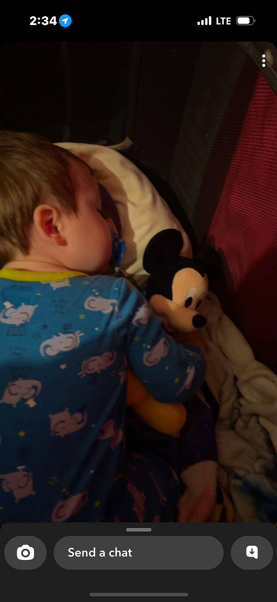 Emerson is registered to the contest to win money with this photo: baby, baby_toddler_clothing, bedtime, car_seat, cheek, child, comfort, finger, fun, linens, mammal, mouth, nose, person, room, sitting, skin, sleeve, stuffed_toy, toddler