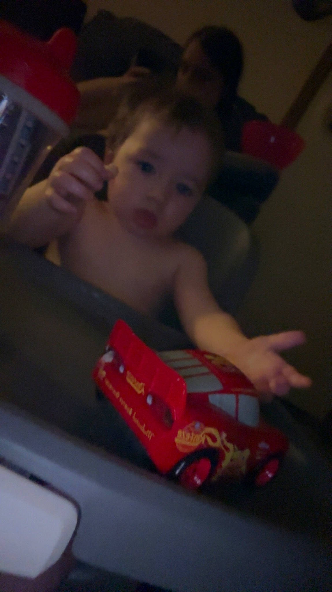 Emerson is registered to the contest to win money with this photo: baby, baby_playing_with_toys, baby_products, baby_toys, bumper, carmine, chest, child, flooring, fun, model_car, mouth, person, plastic, play, riding_toy, room, sitting, toddler, toy