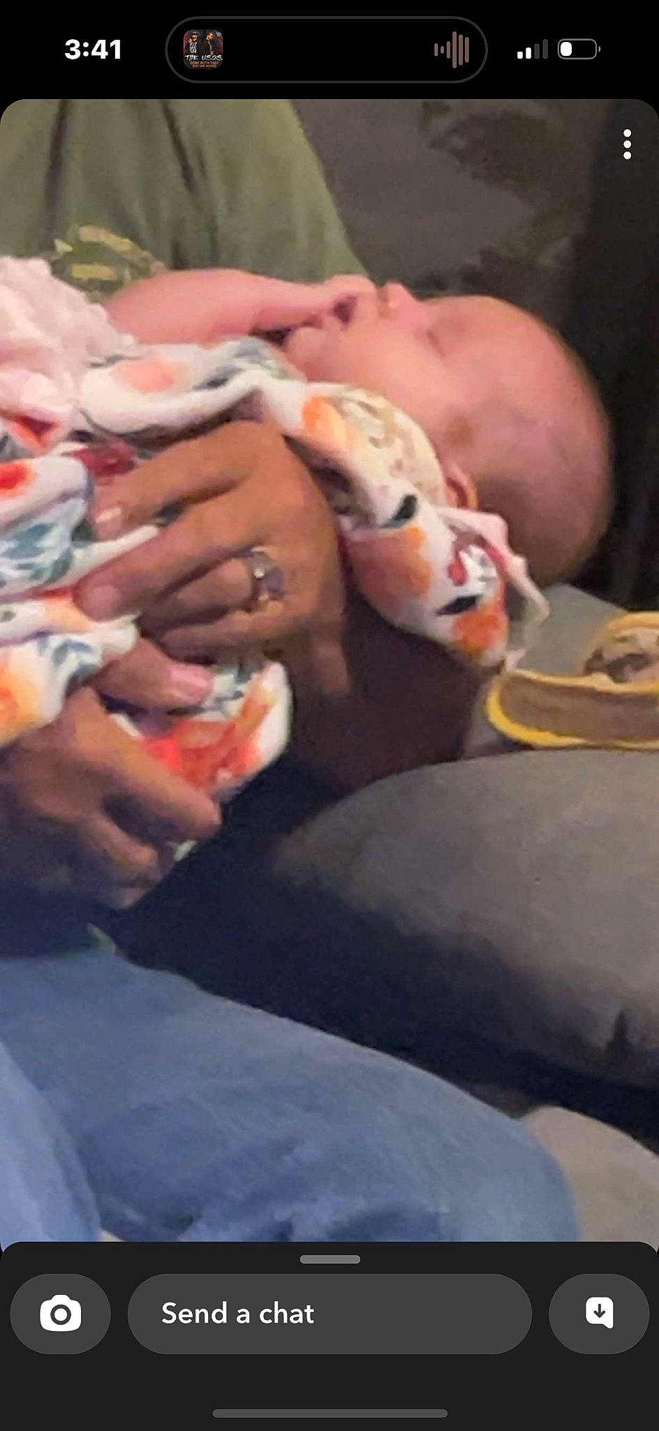 Stella is registered to the contest to win money with this photo: abdomen, carmine, chest, child, comfort, elbow, event, finger, flesh, fun, hand, human_leg, knee, mouth, nail, person, room, sitting, tattoo, thumb