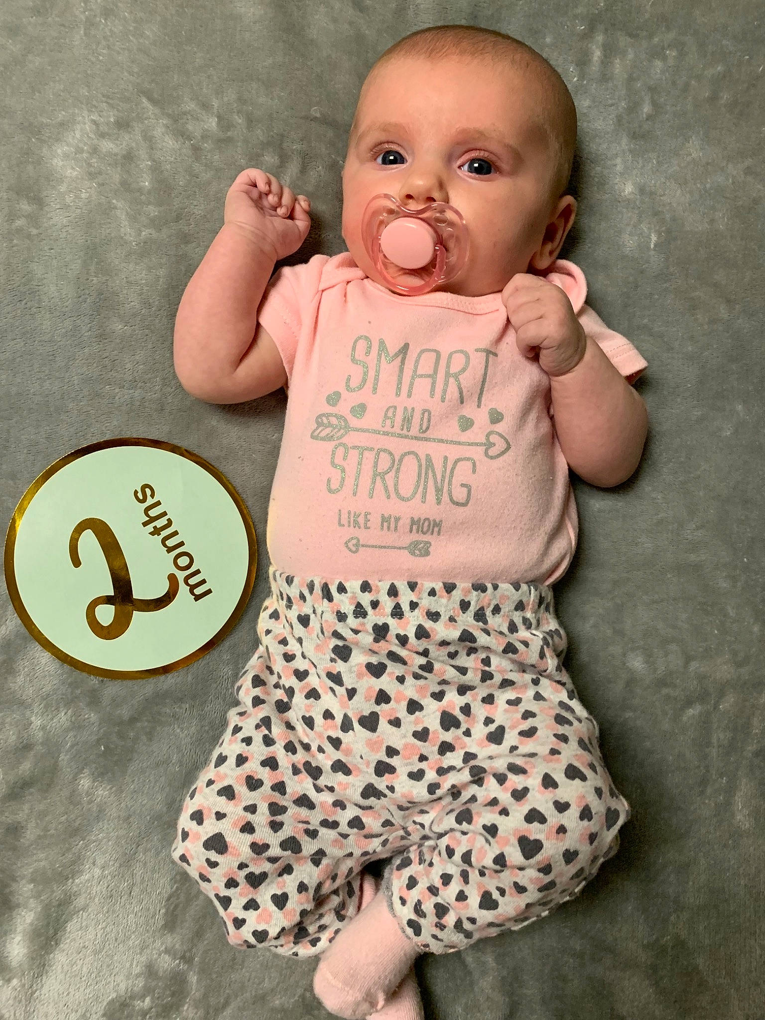 Scarlett Rose is registered to the contest to win money with this photo: baby, baby_products, baby_toddler_clothing, cheek, child, head, pattern, person, pink, product, skin, sleeve, smile, t_shirt, toddler, yellow