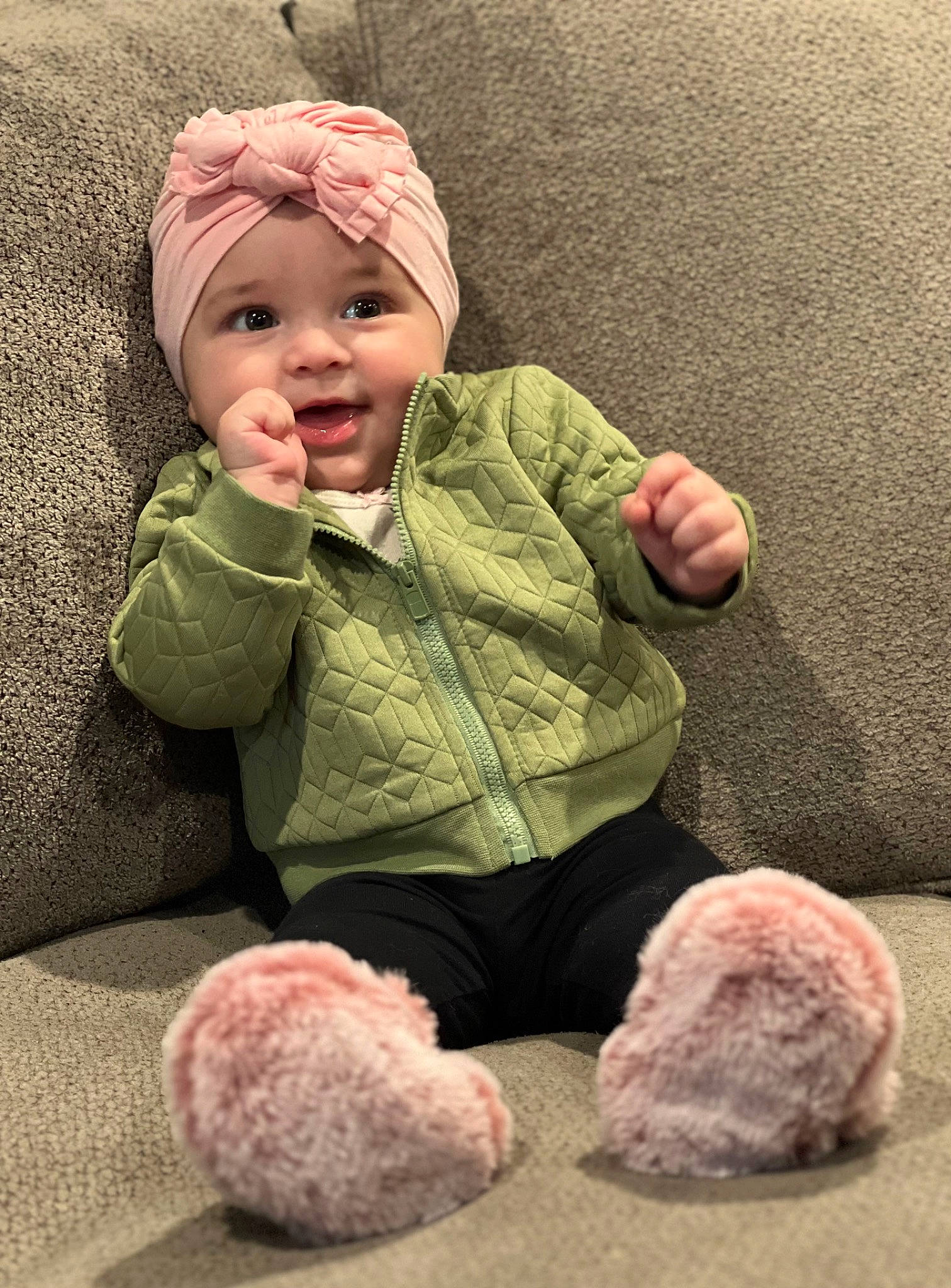 Sanya is registered to the contest to win money with this photo: baby, baby_toddler_clothing, cap, cheek, comfort, face, finger, flooring, happy, head, headgear, headwear, mammal, outerwear, person, pink, skin, sleeve, smile, textile