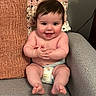baby, child, comfort, couch, cozy, cute, diaper, expression, face, hair, happy, indoor, infant, person, pillows, plush, sitting, skin, smiling, young