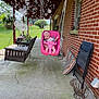 baby, swing, porch, bubbles, brick_wall, outdoor, child, seat, pink, grass, plants, window, chair, concrete, sunlight, rope, flower_headband, cushion, folding_chair, playtime