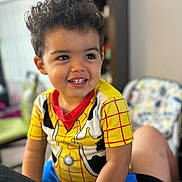 Alexander is registered to the contest to win money with this photo: blackhair, bodypart, boy, child, clothing, face, hair, happy, head, male, mouth, pants, person, photography, portrait, sitting, sleeve, smile, t_shirt, teeth