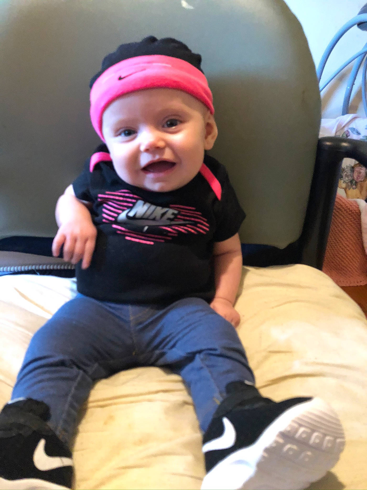 Skyla is registered to the contest to win money with this photo: baby, baby_products, cheek, child, cool, fun, headgear, headwear, person, pink, sitting, skin, toddler, vacation
