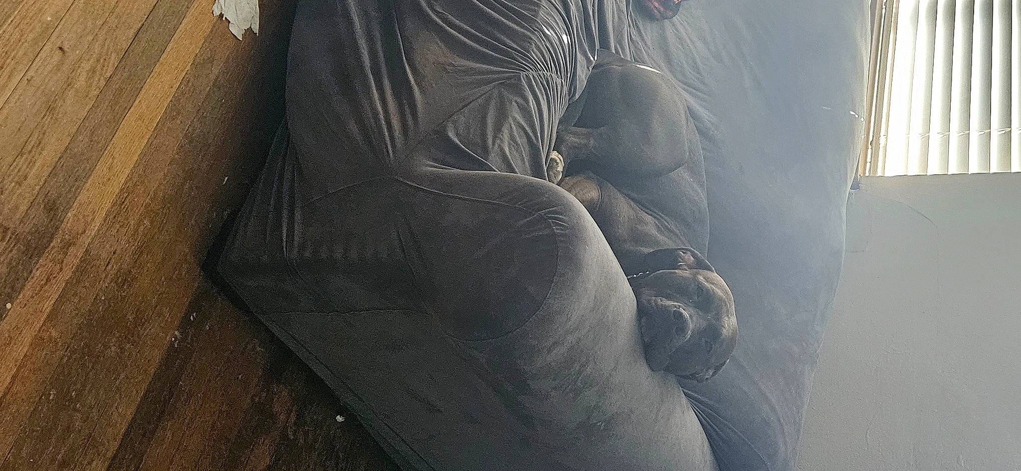 Tipsy is registered to the contest to win money with this photo: art, auto_part, automotive_design, automotive_tire, automotive_wheel_system, chair, comfort, foot, grey, human_body, human_leg, knee, leg, personal_protective_equipment, sitting, thigh, tints_and_shades, vehicle_door, window, wood