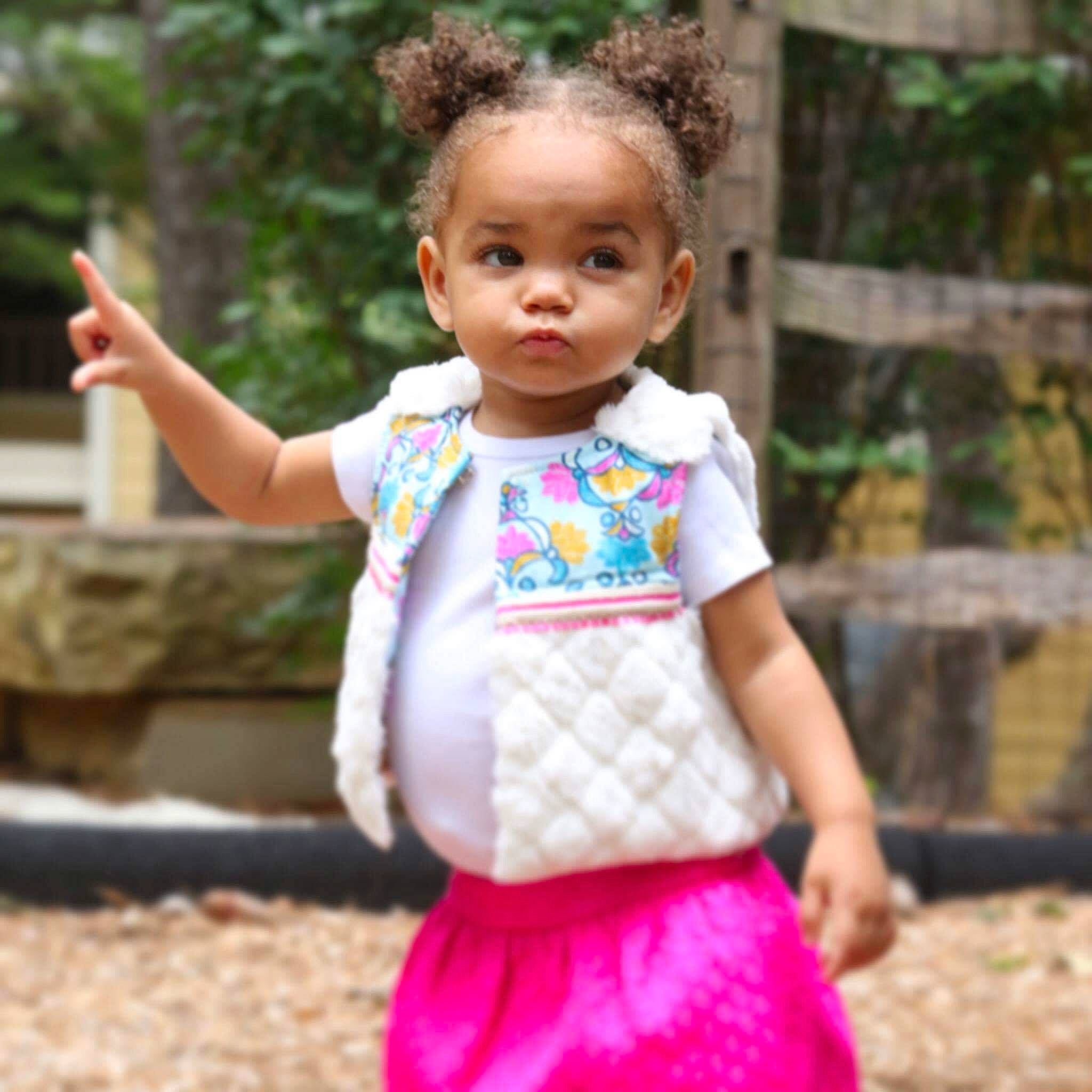 Heaven is registered to the contest to win money with this photo: baby_toddler_clothing, beauty, child, grass, happy, leisure, magenta, neck, outerwear, person, pink, shoulder, sleeve, smile, street_fashion, summer, t_shirt, toddler, tree, trunk