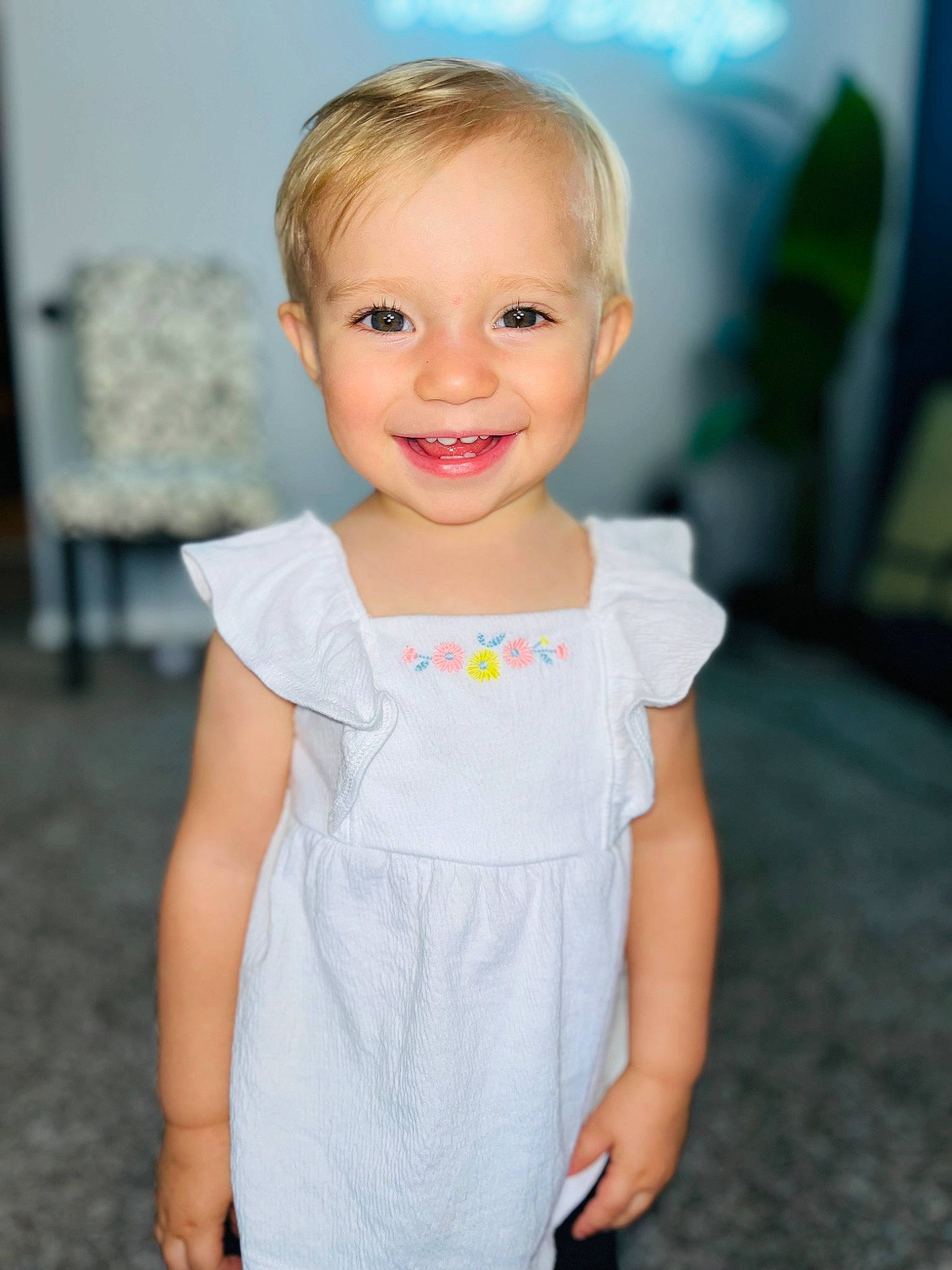 Sofia joined the competition — help win amazing prizes! baby, baby_toddler_clothing, cheek, child, day_dress, dress, eye, face, gesture, hair, hairstyle, happy, head, joy, neck, one_piece_garment, person, skin, sleeve, smile