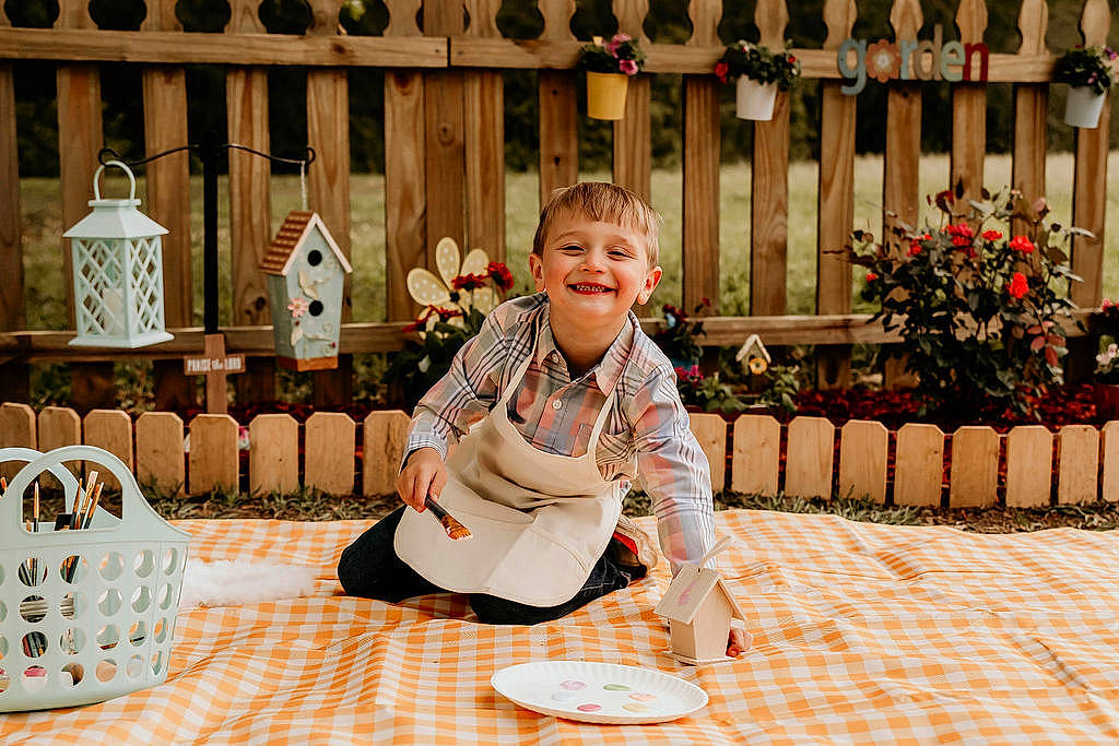 Preston joined the competition — help win amazing prizes! child, event, fence, flooring, floral_design, flower, flowerpot, fun, garden, happy, houseplant, joy, leisure, pattern, peach, person, plant, sitting, smile, toddler