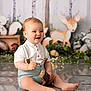 baby, child, sitting, toy, wooden_toy, white_shirt, suspenders, shorts, smiling, indoor, floor, decor, background, illustration, deer, forest, fairy_lights, cute, portrait, happy