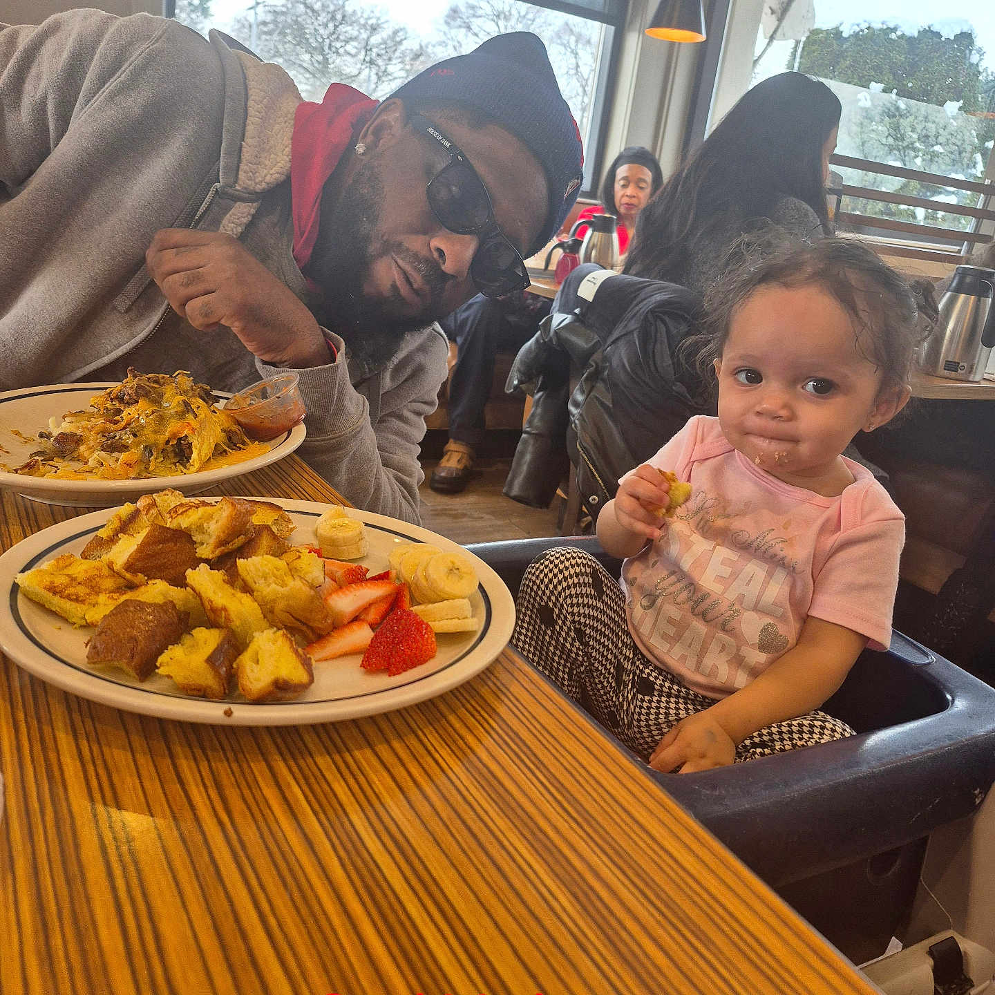 Zaria Satterfield joined the competition — help win amazing prizes! accessories, adult, baby, cafeteria, clothing, diningtable, food, footwear, furniture, glasses, indoors, lunch, male, man, meal, person, plate, restaurant, shoe, wood