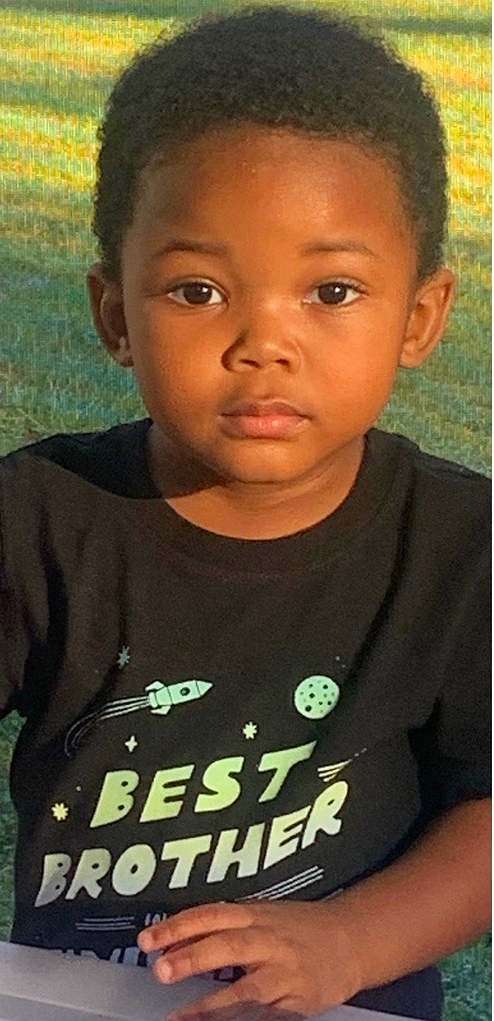 Fletcher is registered to the contest to win money with this photo: black, black_hair, cheek, chin, cool, eye, eyebrow, forehead, hair, hairstyle, happy, lip, neck, nose, person, photograph, skin, sleeve, smile, t_shirt