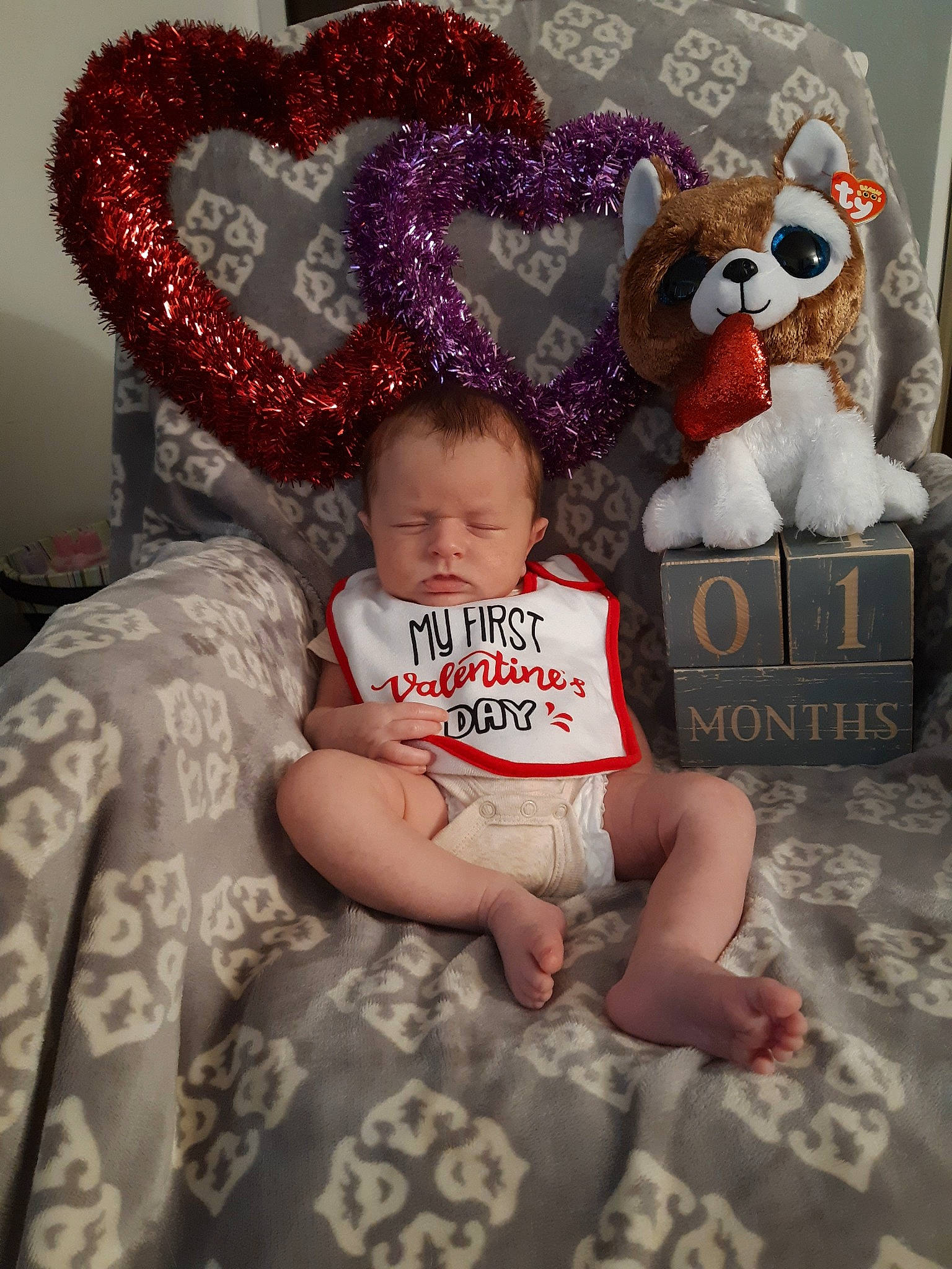 Xavier is registered to the contest to win money with this photo: baby, cheek, child, ear, fun, person, pink, room, smile, stuffed_toy, teddy_bear, toddler, toy