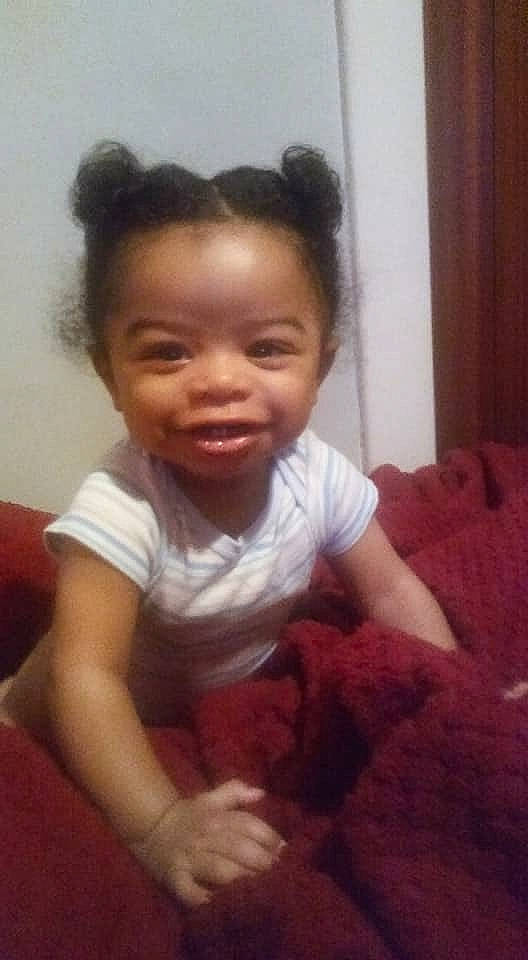 Samir is registered to the contest to win money with this photo: arm, cheek, child, day, ear, eye, face, forehead, girl, hair, hairstyle, head, human_hair_color, infant, mouth, nose, organ, person, skin, smile