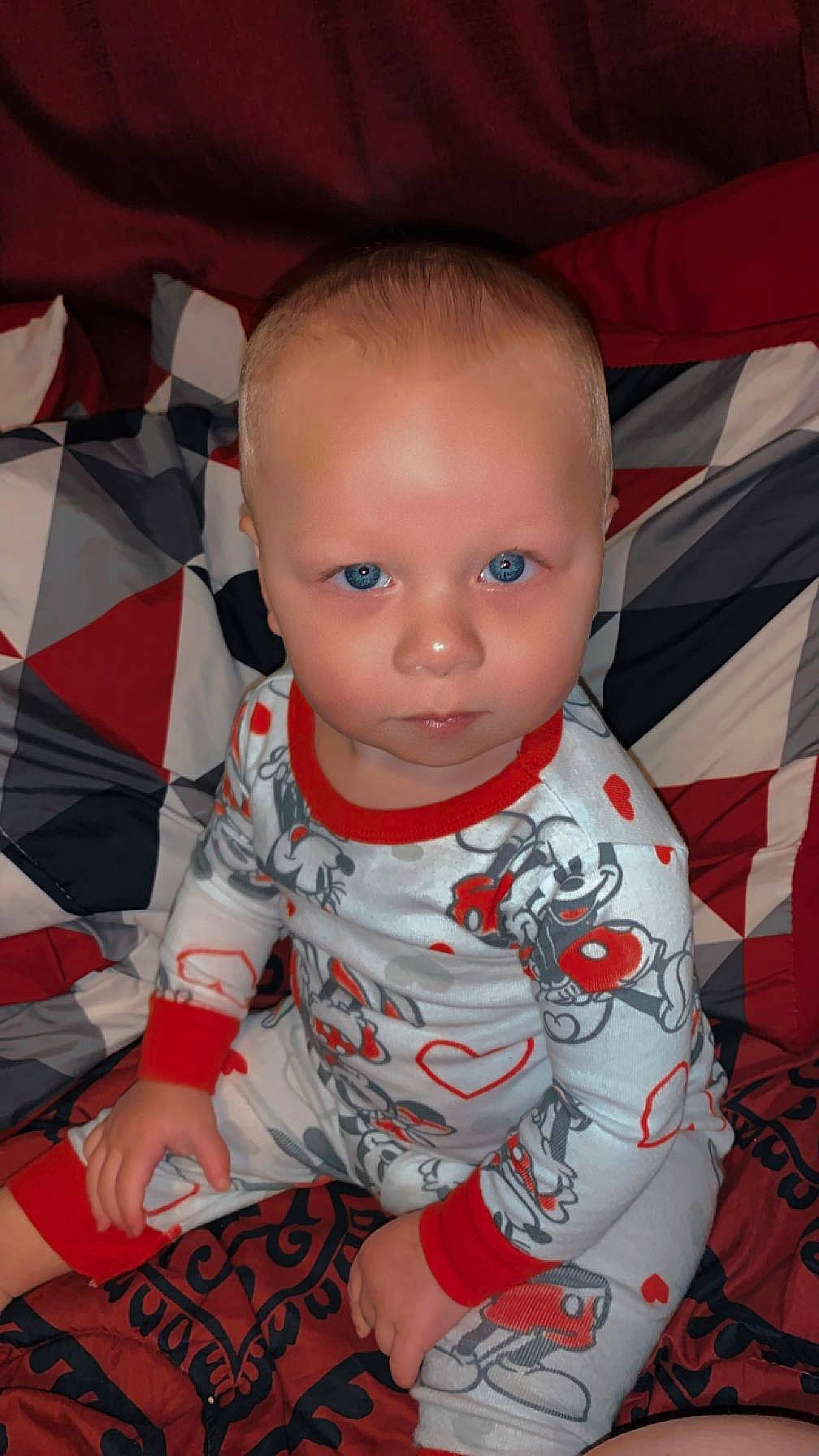 Graycen is registered to the contest to win money with this photo: baby, baby_toddler_clothing, carmine, cheek, child, comfort, cool, eye, facial_expression, fun, human, iris, lip, mouth, nose, person, red, sitting, skin, sleeve