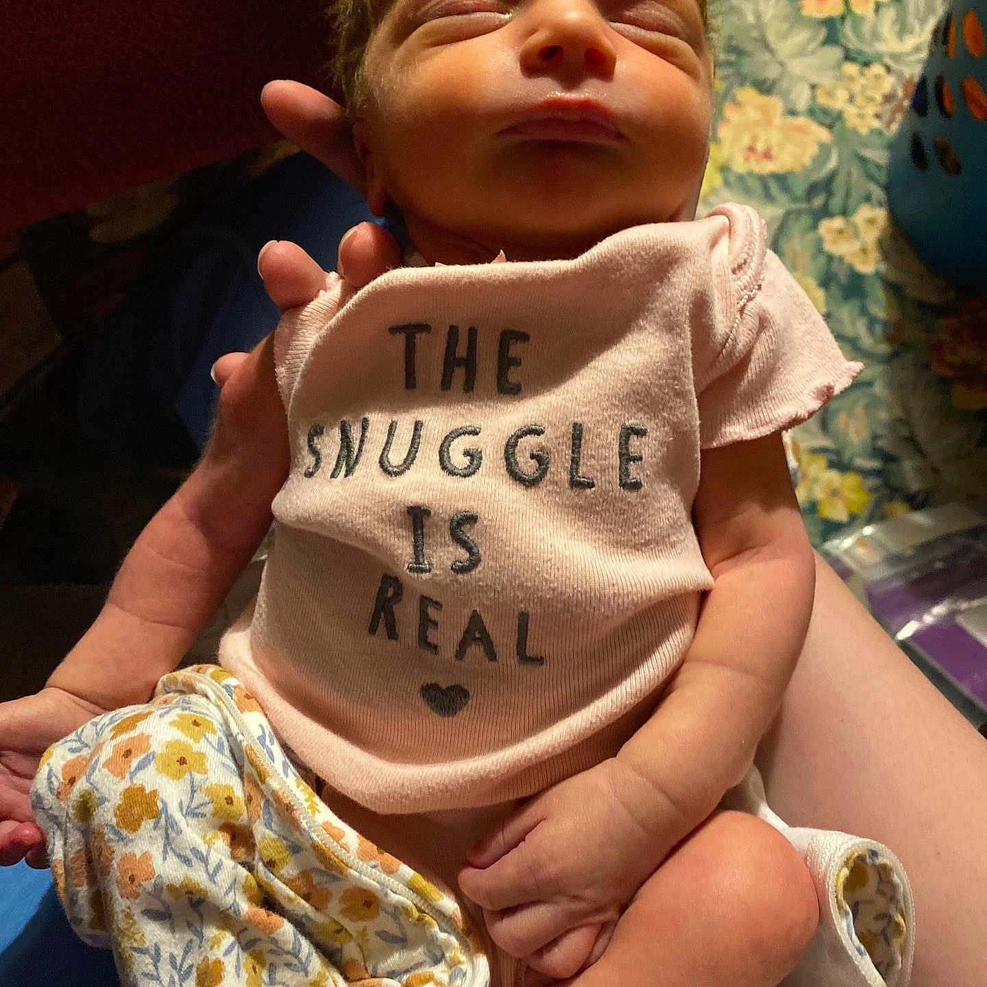 Sarah is registered to the contest to win money with this photo: baby, bed, blanket, clothing, cushion, face, furniture, head, homedecor, newborn, number, person, photography, portrait, quilt, sitting, sleeping, symbol, t_shirt, text