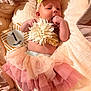 Alani joined the competition — help win amazing prizes! baby, infant, tutu, headband, flower, blanket, soft_fabric, milestone_card, one_month, cute, newborn, sucking_fist, pink, peach, lying_down, portrait, indoors, celebration, child, adorable