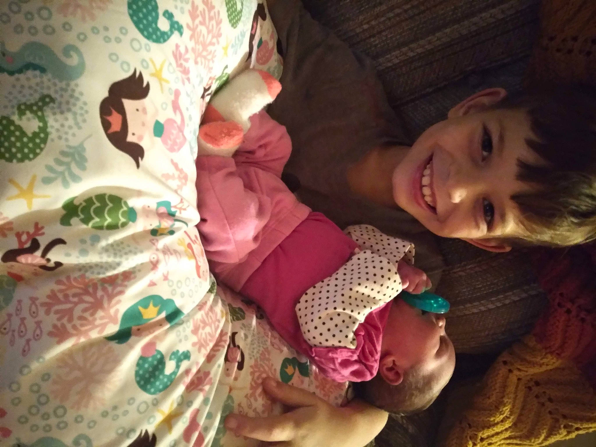 Logan is registered to the contest to win money with this photo: cheek, child, eye, face, finger, hair, happy, head, human_body, iris, joy, lip, mouth, nose, organ, person, plant, skin, smile, textile