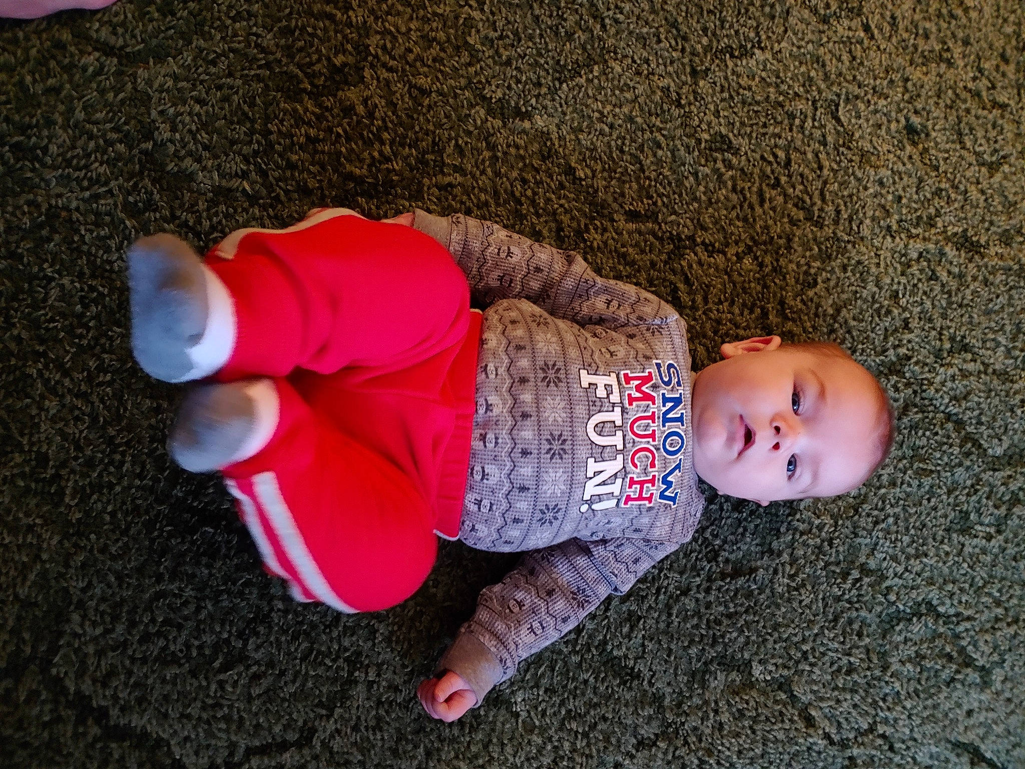 Bently joined the competition — help win amazing prizes! baby, baby_products, baby_toddler_clothing, carmine, child, finger, flooring, foot, fun, human_leg, knee, magenta, person, play, sitting, sleeve, sock, thigh, thumb, toddler