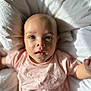 Eira joined the competition — help win amazing prizes! baby, infant, child, blue_eyes, pink_shirt, bed, white_bed, soft_light, portrait, close_up, face, looking_up, cute, sleepwear, newborn, person, skin, expression, indoor, young